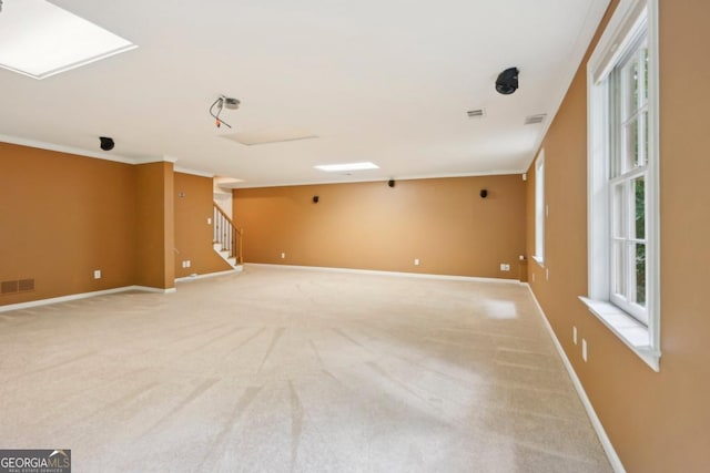 10660 Dunoon Dr, Alpharetta, GA 30022 - unfurnished room with stairway, light carpet, ornamental molding, and baseboards