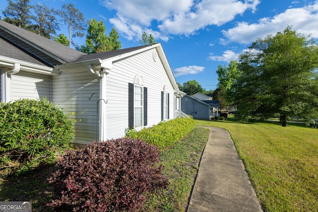 558 Wilder Dr, Columbus, GA 31907 - view of home's exterior featuring a yard and roof with shingles