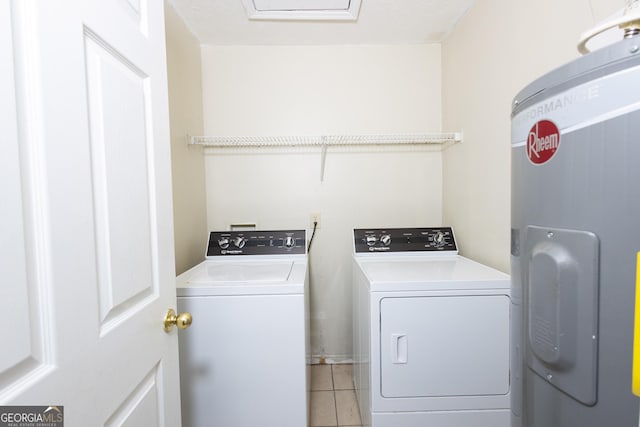 558 Wilder Dr, Columbus, GA 31907 - laundry room featuring washing machine and dryer, water heater, and light tile patterned floors