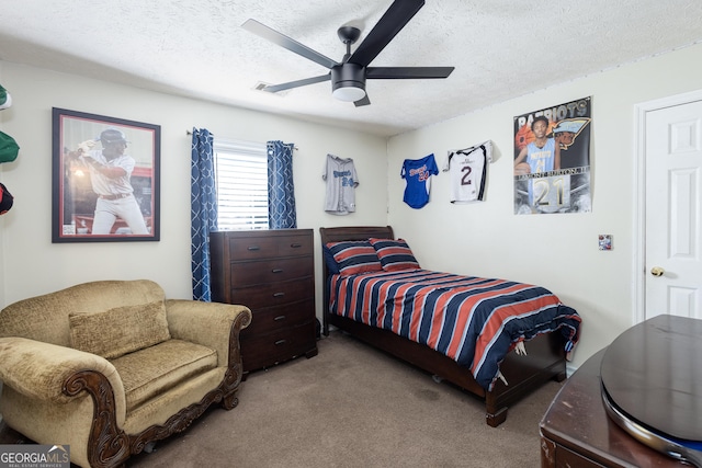 558 Wilder Dr, Columbus, GA 31907 - carpeted bedroom with a textured ceiling and ceiling fan