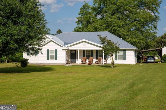 1351 Old Screven Rd, Jesup, GA 31545 - view of front of home featuring covered porch, a front lawn, and metal roof