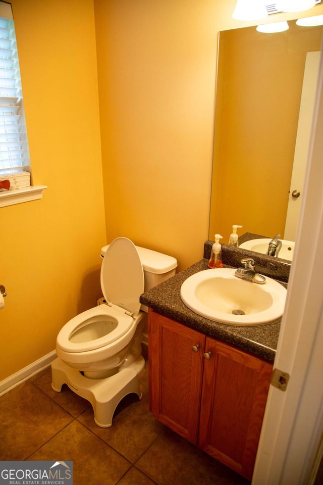 1351 Old Screven Rd, Jesup, GA 31545 - bathroom featuring tile patterned floors, toilet, and vanity
