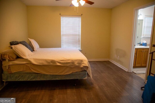 1351 Old Screven Rd, Jesup, GA 31545 - bedroom with dark wood-style floors, ensuite bathroom, and ceiling fan