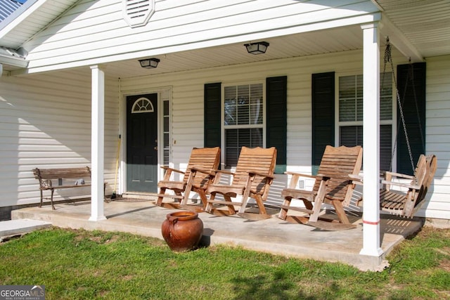 1351 Old Screven Rd, Jesup, GA 31545 - view of exterior entry with a porch