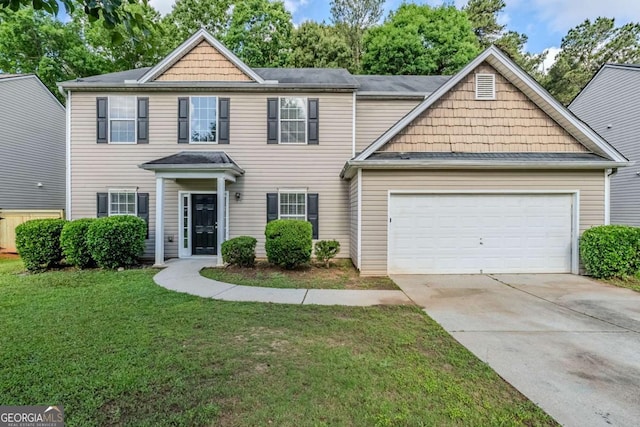 6285 Polar Fox Ct, Riverdale, GA 30296 - view of front of home featuring a garage, driveway, and a front yard