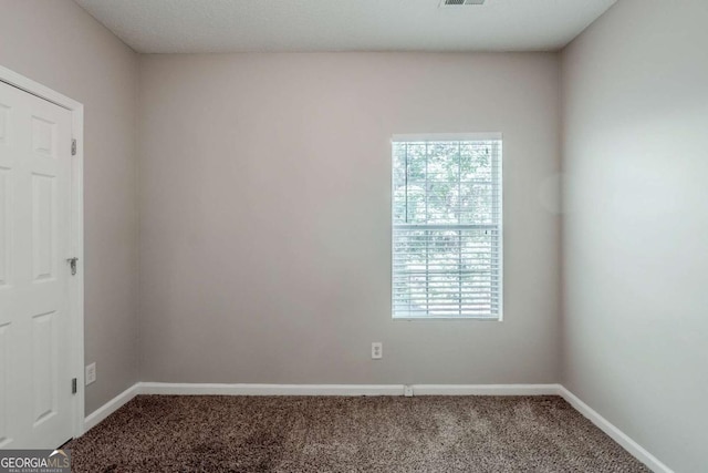 6285 Polar Fox Ct, Riverdale, GA 30296 - carpeted spare room with baseboards