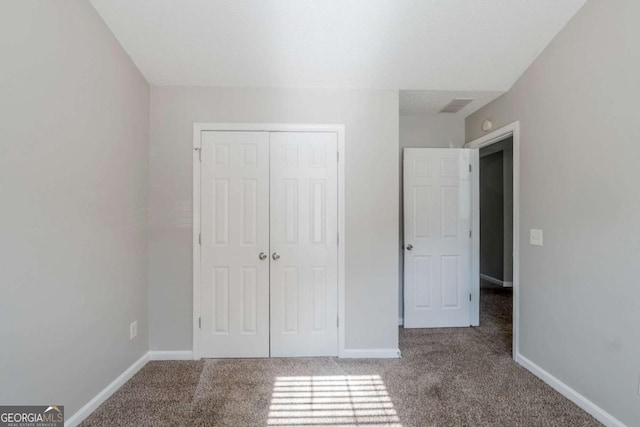 6285 Polar Fox Ct, Riverdale, GA 30296 - unfurnished bedroom featuring carpet floors and a closet