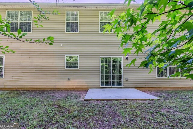 6285 Polar Fox Ct, Riverdale, GA 30296 - rear view of house featuring a patio