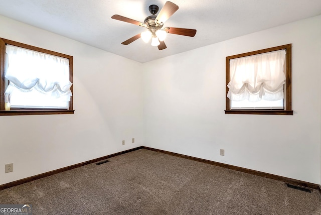 22 Ridge Haven Dr, Cleveland, GA 30528 - unfurnished room with healthy amount of natural light, carpet floors, a ceiling fan, and baseboards