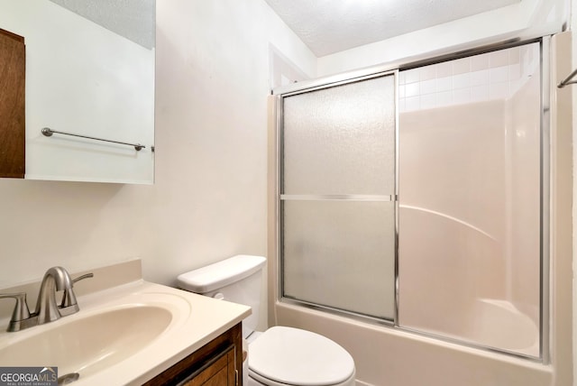 22 Ridge Haven Dr, Cleveland, GA 30528 - full bathroom featuring toilet, vanity, combined bath / shower with glass door, and a textured ceiling