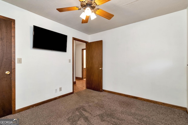 22 Ridge Haven Dr, Cleveland, GA 30528 - carpeted spare room with baseboards and ceiling fan
