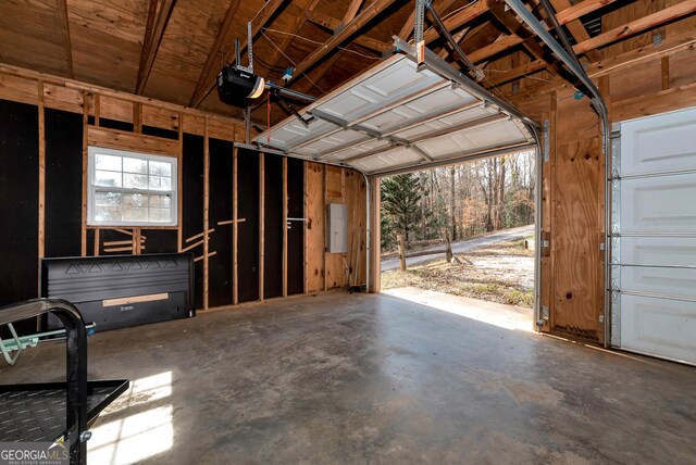 22 Ridge Haven Dr, Cleveland, GA 30528 - garage featuring a garage door opener and electric panel