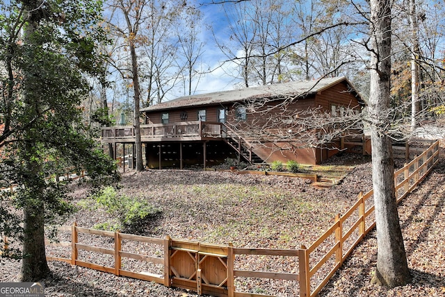 22 Ridge Haven Dr, Cleveland, GA 30528 - back of house with stairs, a deck, and fence