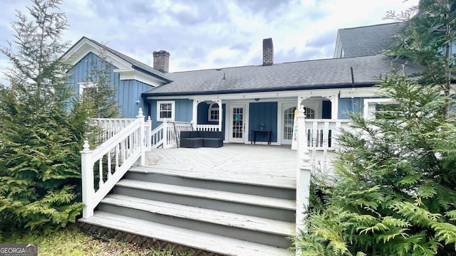 6 River St SW, Cave Spring, GA 30124 - rear view of property featuring a chimney and roof with shingles