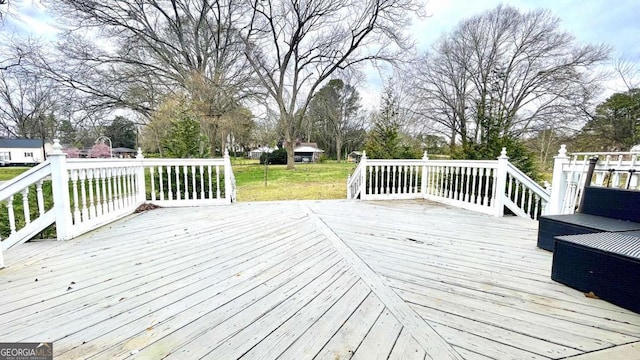 6 River St SW, Cave Spring, GA 30124 - wooden deck with a lawn
