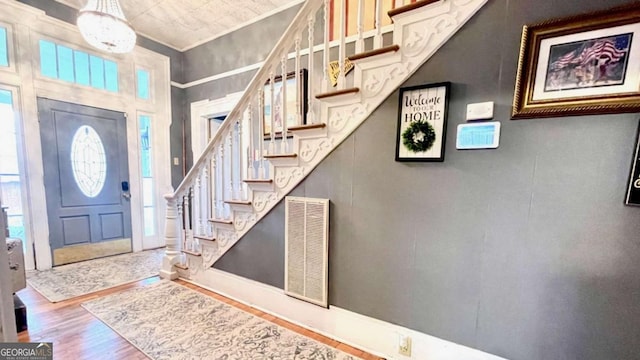 6 River St SW, Cave Spring, GA 30124 - foyer featuring stairs, wood finished floors, and ornamental molding