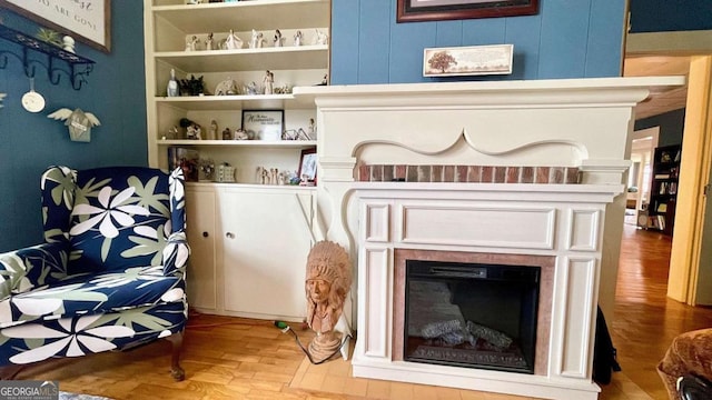 6 River St SW, Cave Spring, GA 30124 - detailed view of wood finished floors and a glass covered fireplace