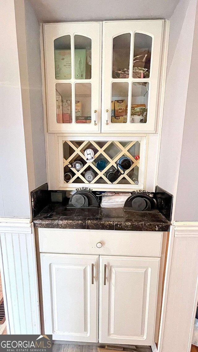 6 River St SW, Cave Spring, GA 30124 - bar featuring wainscoting and a decorative wall
