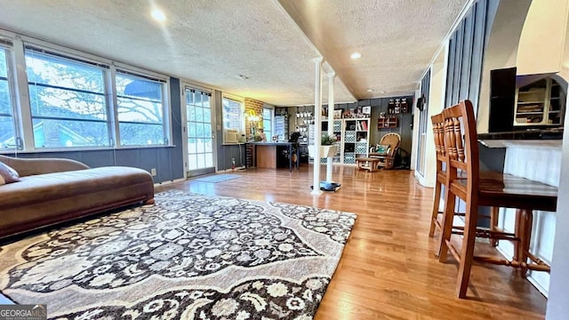 6 River St SW, Cave Spring, GA 30124 - living room with a textured ceiling, wood finished floors, baseboards, and recessed lighting