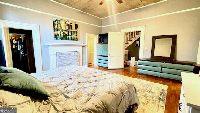 6 River St SW, Cave Spring, GA 30124 - bedroom with wood finished floors and a fireplace
