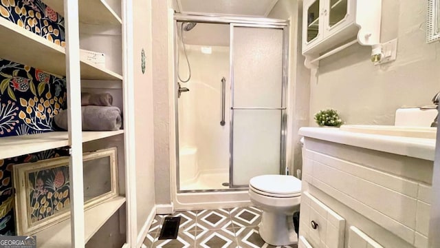 6 River St SW, Cave Spring, GA 30124 - full bathroom featuring a shower stall, toilet, and vanity