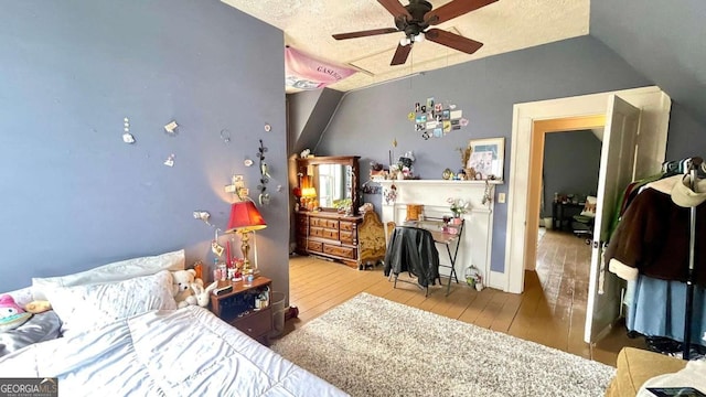 6 River St SW, Cave Spring, GA 30124 - bedroom featuring wood-type flooring, a textured ceiling, and ceiling fan