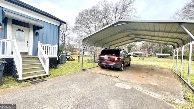 6 River St SW, Cave Spring, GA 30124 - view of vehicle parking with a detached carport and asphalt driveway