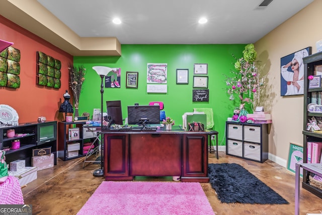 office featuring concrete floors, recessed lighting, and baseboards