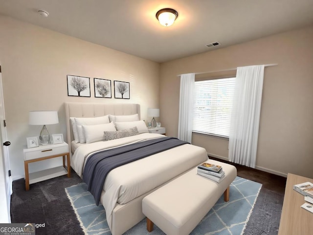 118 Garrett Dr, Eatonton, GA 31024 - bedroom with dark colored carpet and baseboards