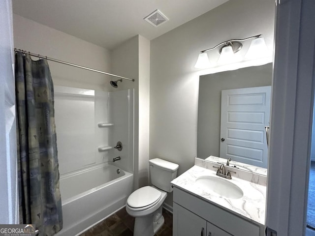 118 Garrett Dr, Eatonton, GA 31024 - full bathroom featuring toilet, vanity, and shower / bathtub combination with curtain