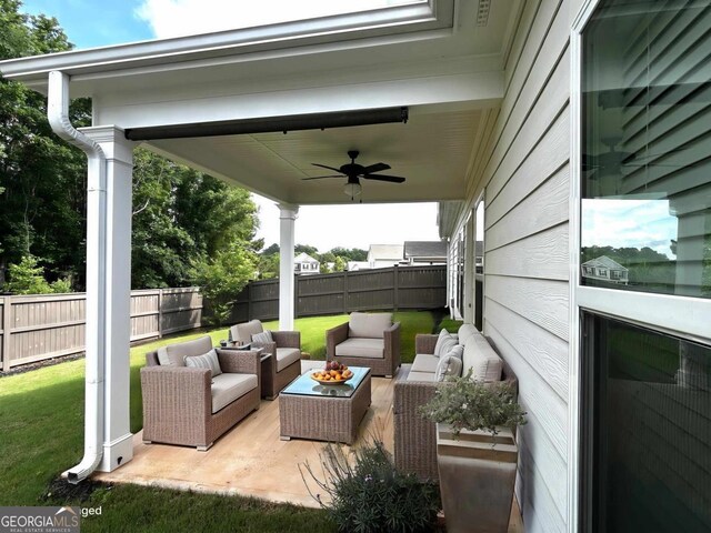 118 Garrett Dr, Eatonton, GA 31024 - view of patio / terrace with an outdoor living space and a ceiling fan