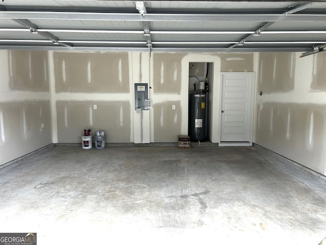 118 Garrett Dr, Eatonton, GA 31024 - garage featuring electric water heater and electric panel