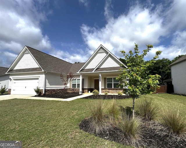 118 Garrett Dr, Eatonton, GA 31024 - view of front of property featuring an attached garage, a front lawn, driveway, and stone siding