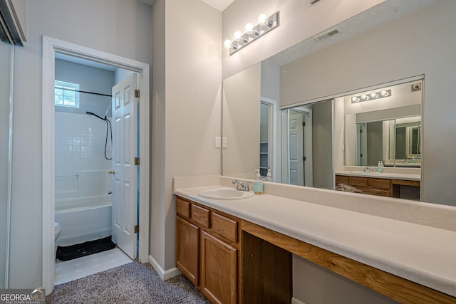 full bathroom with vanity, tub / shower combination, and toilet