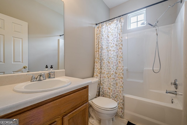 full bath with toilet, shower / tub combo, and vanity