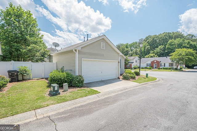garage with driveway