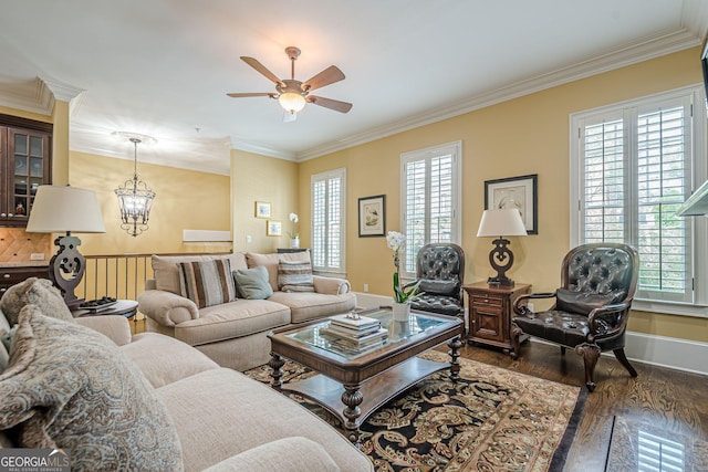 2295 Falmouth Ct SE Unit 23, Smyrna, GA 30080 - living area with ornamental molding, dark wood-type flooring, a ceiling fan, and a chandelier