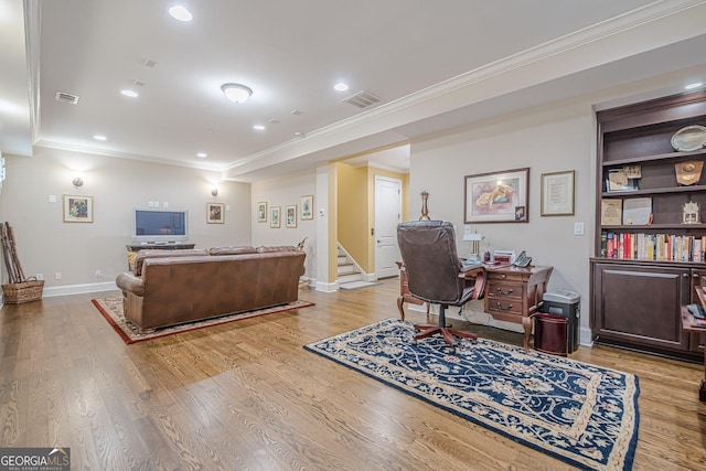 2295 Falmouth Ct SE Unit 23, Smyrna, GA 30080 - living room with crown molding, light wood-type flooring, recessed lighting, and stairs