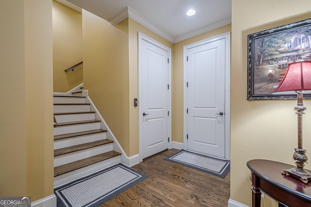 2295 Falmouth Ct SE Unit 23, Smyrna, GA 30080 - foyer with wood finished floors, crown molding, and stairway