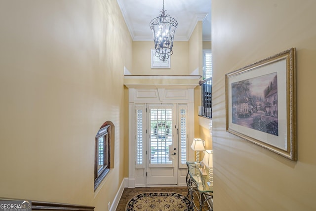 2295 Falmouth Ct SE Unit 23, Smyrna, GA 30080 - foyer featuring a chandelier, crown molding, and a high ceiling