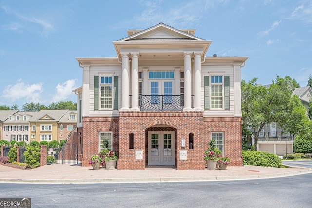 2295 Falmouth Ct SE Unit 23, Smyrna, GA 30080 - greek revival inspired property featuring french doors and brick siding