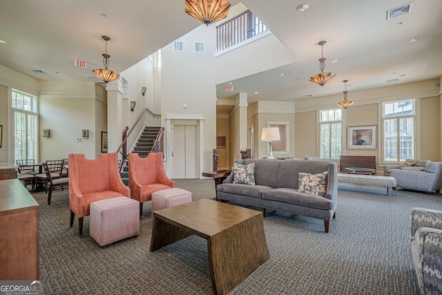 2295 Falmouth Ct SE Unit 23, Smyrna, GA 30080 - living area featuring carpet flooring, stairs, a towering ceiling, and recessed lighting