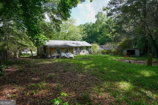 377 Black Oak Ct, Lawrenceville, GA 30046 - view of yard with a shed and an outdoor structure