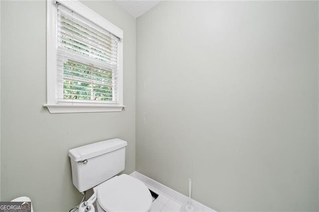 1763 Benningfield Dr SW, Marietta, GA 30064 - bathroom with toilet and baseboards