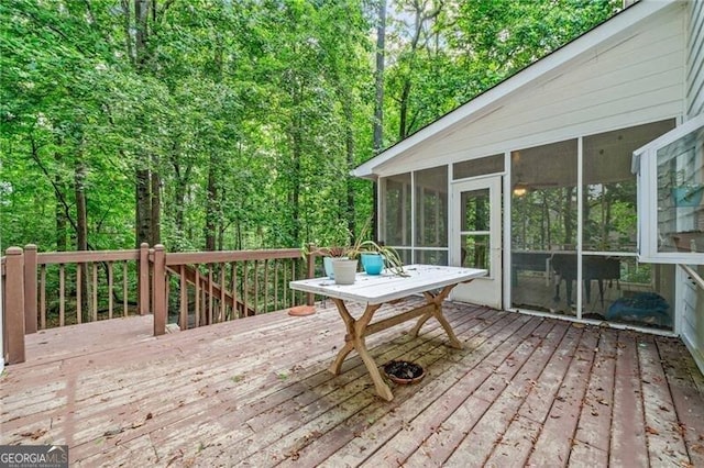 1763 Benningfield Dr SW, Marietta, GA 30064 - wooden deck with a sunroom and a forest view