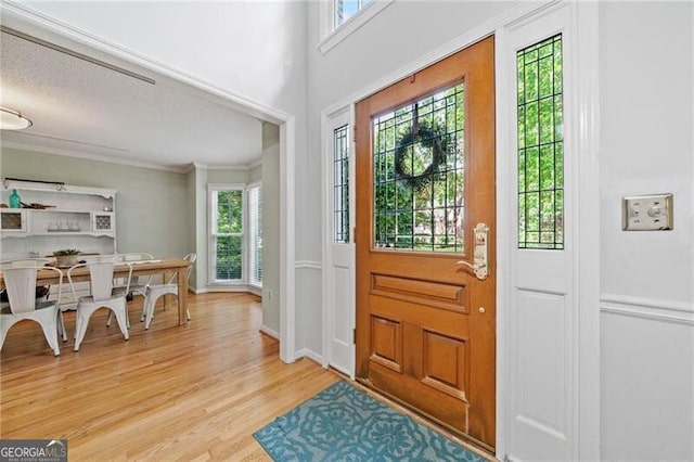 1763 Benningfield Dr SW, Marietta, GA 30064 - entrance foyer with wood finished floors and ornamental molding