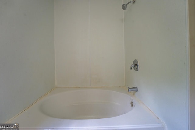 bathroom with shower / bathtub combination