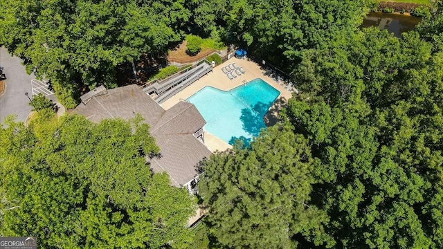 drone / aerial view of a pool area