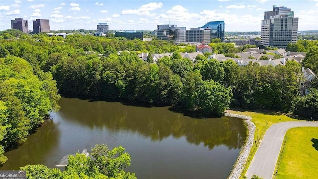 view of urban area featuring a large body of water