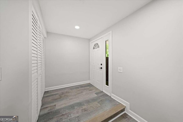 entrance foyer with baseboards, recessed lighting, and wood finished floors